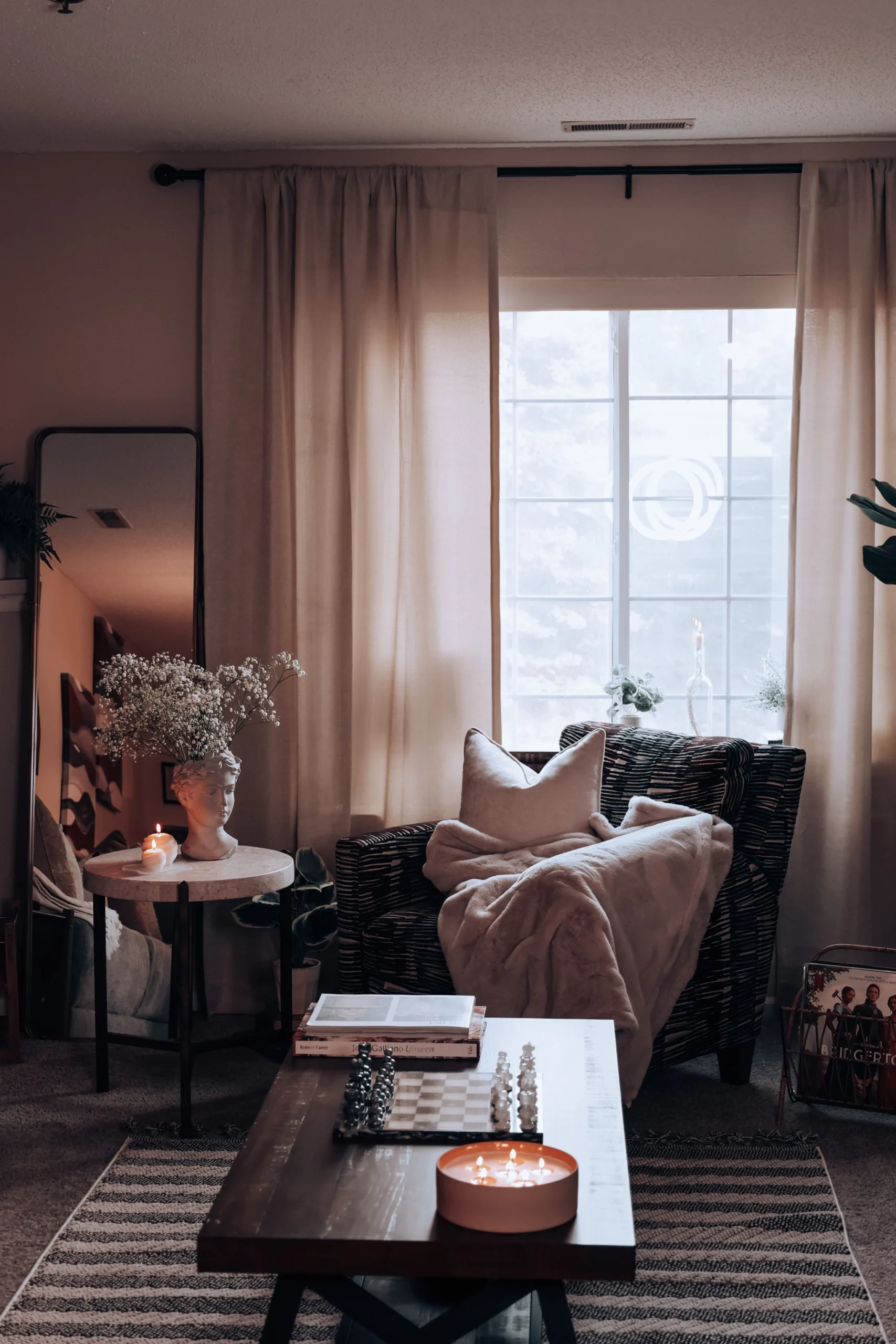 stylish living room with statement wicker armchair