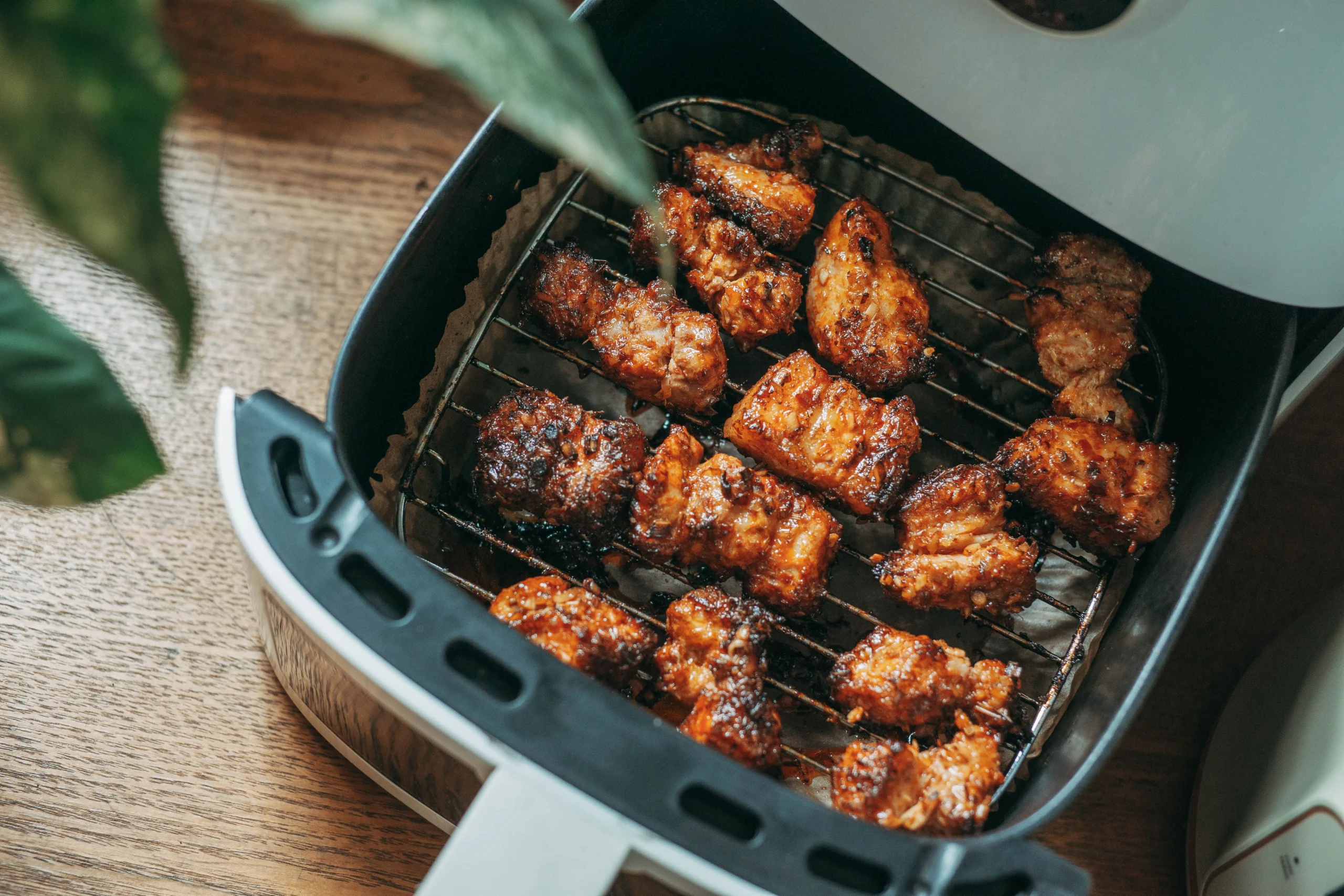 crispy food cooked in modern air fryer