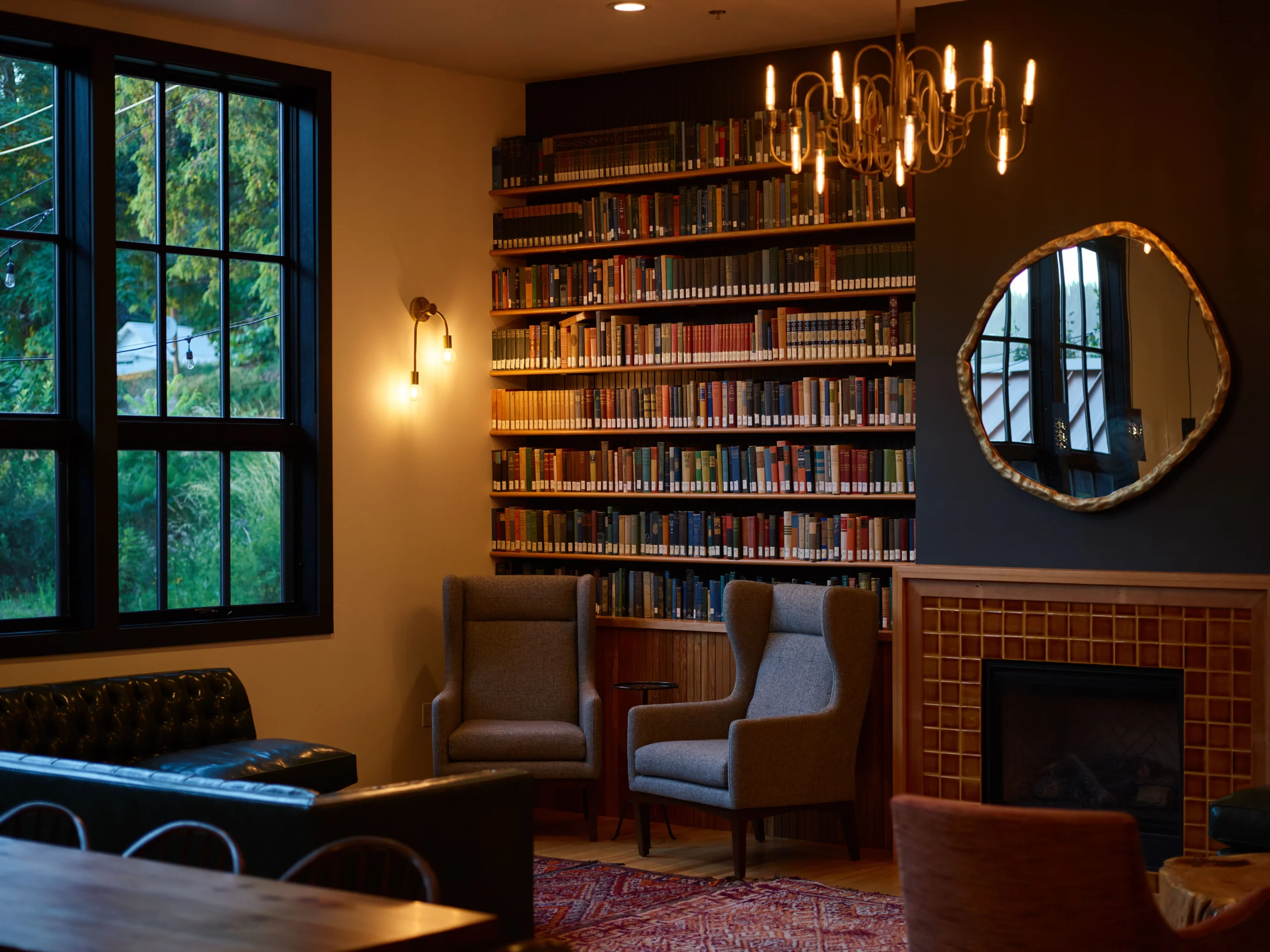 warm cosy study with bookshelves and armchair