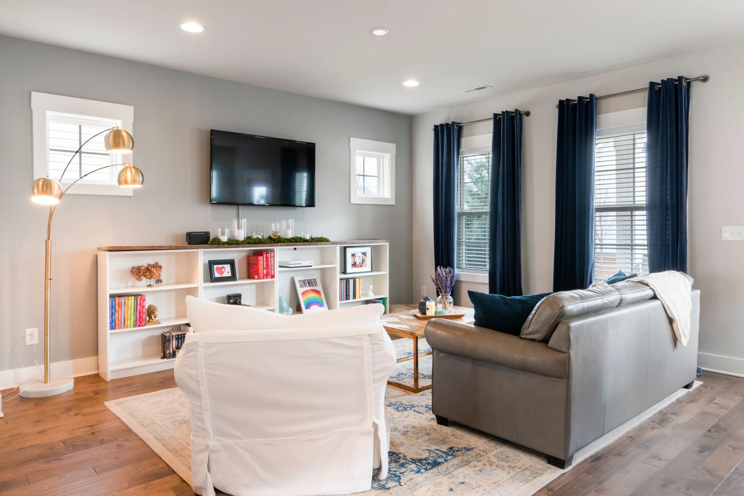 living room with blue curtains matched to interior colour scheme