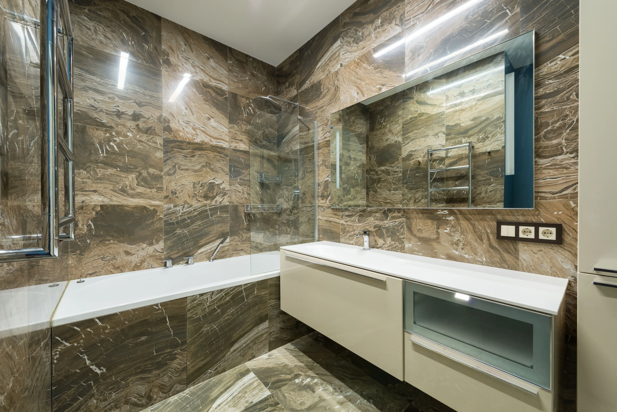 modern bathroom renovation with marble walls and layout